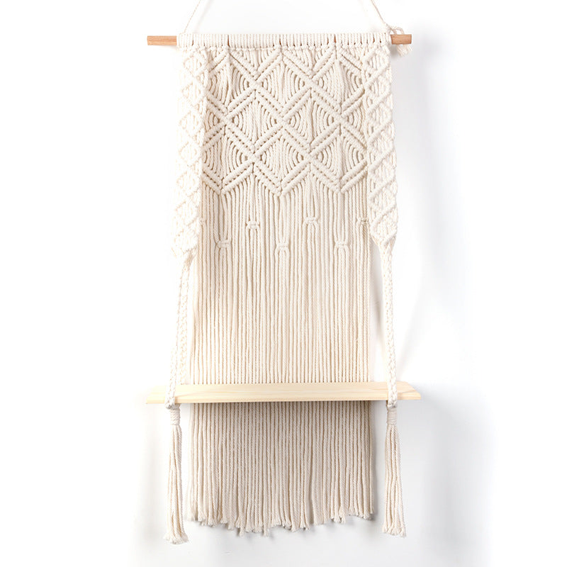 Macramé wall shelf with integrated plant holder