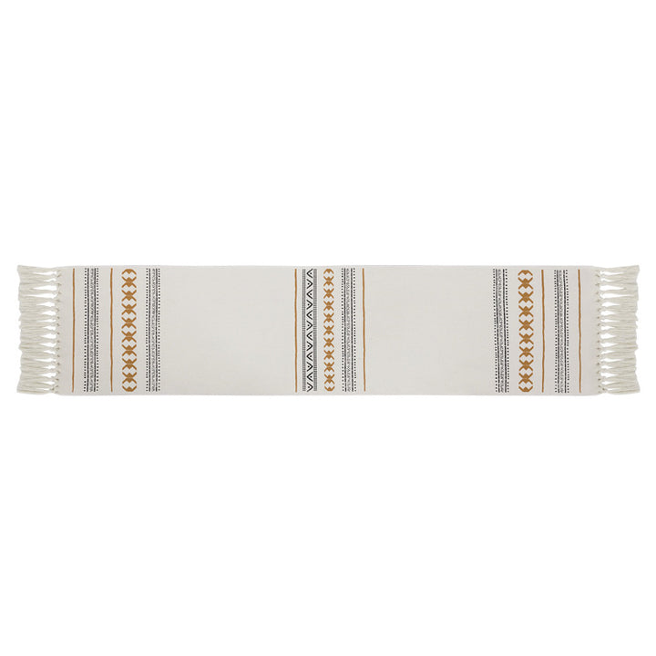 Woven Boho table runner made of cotton blend with decorative fringes and graphic stripe pattern