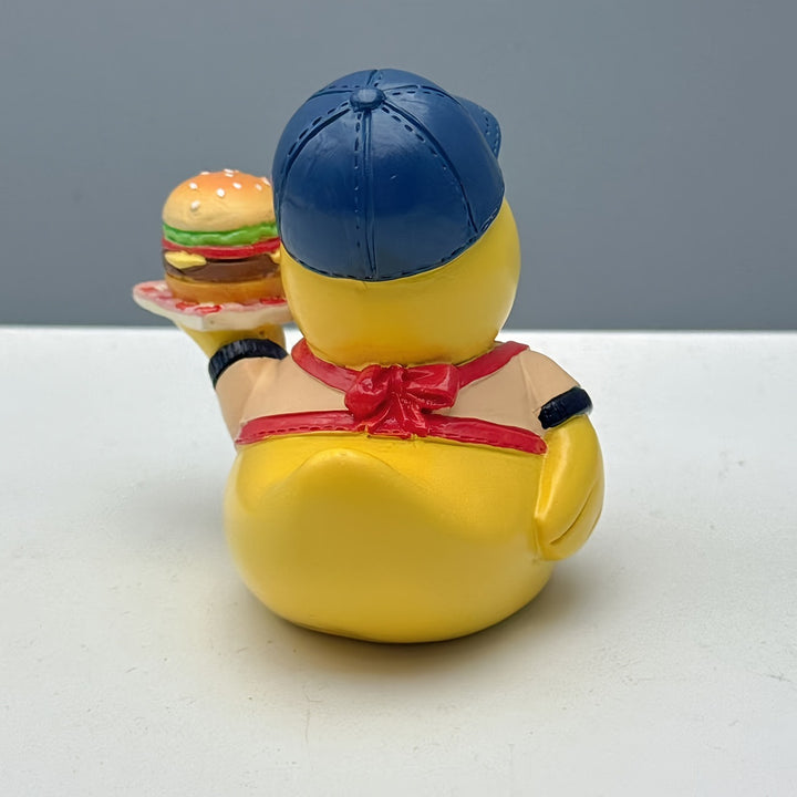 Funny rubber duck as grill master