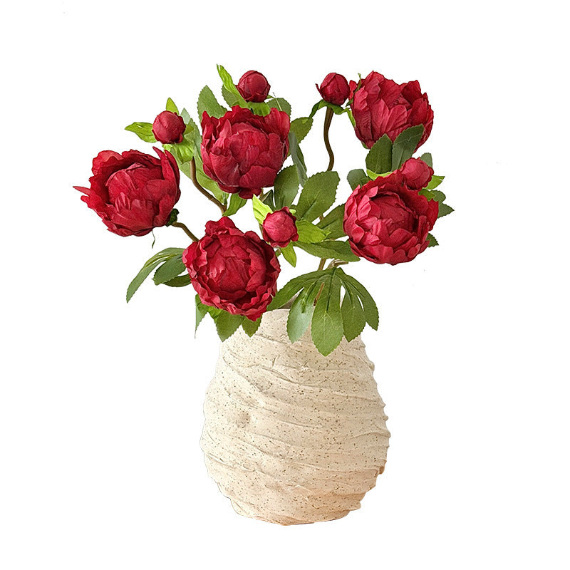 Artificial peony bouquet with delicate flowers and leaves