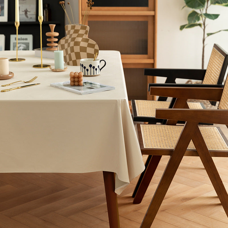 Rectangular easy-care tablecloth made of cotton blend with water-repellent coating and fine texture