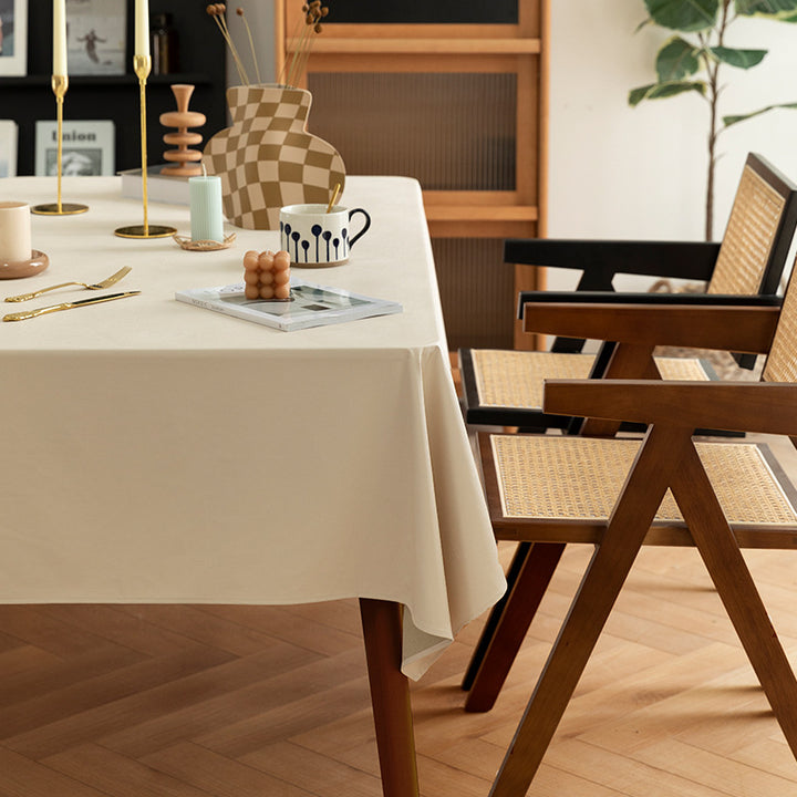 Rectangular easy-care tablecloth made of cotton blend with water-repellent coating and fine texture