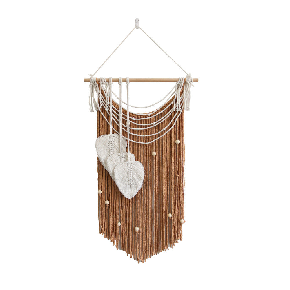 Artistic wall hanging made of macrame with hearts