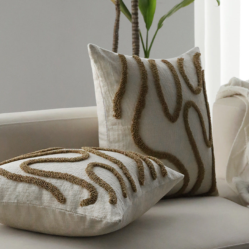 Square decorative cushion cover with hand-tufted loop appliqué and fine linen look