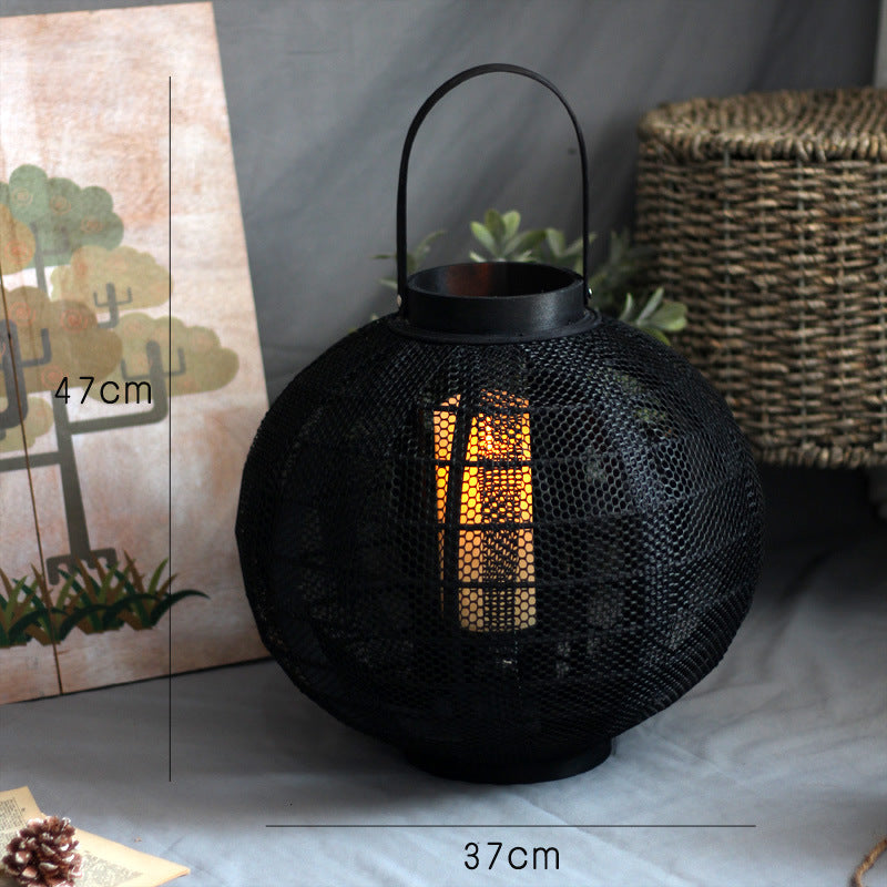 Elegant metal lantern with net design