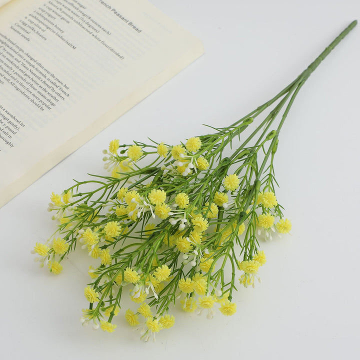Decorative artificial flower branch with delicate purple flowers