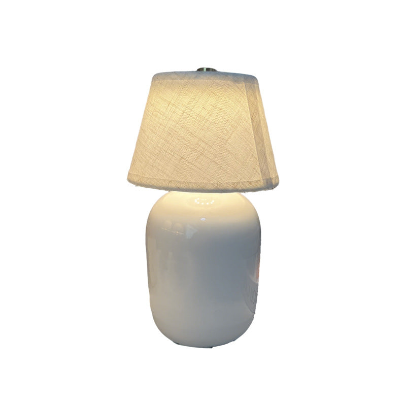 Ceramic bedside lamp with linen shade