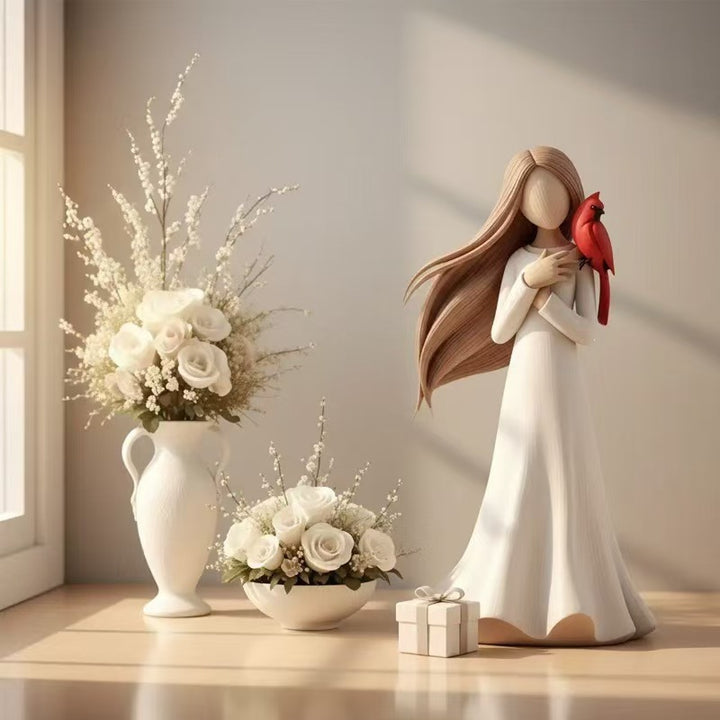 Figurine Holding Bird