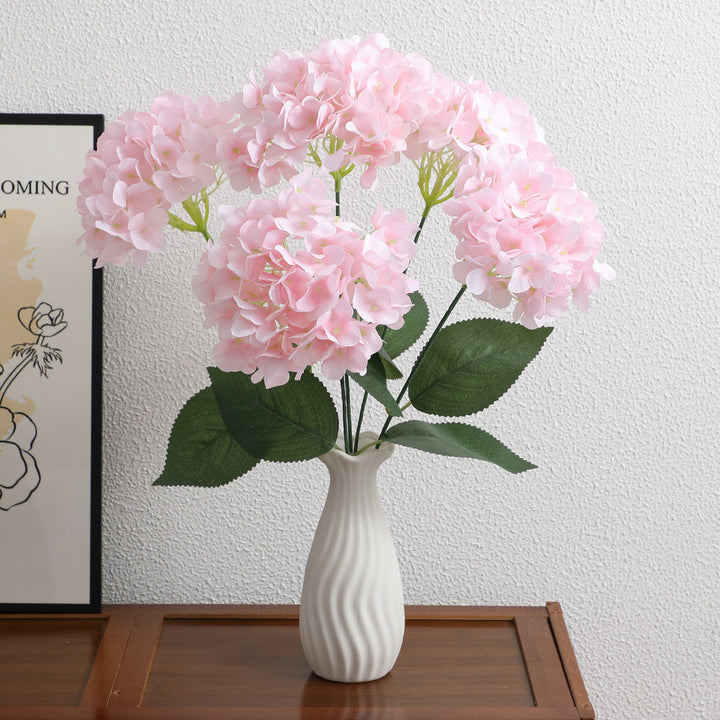 Decorative artificial flower arrangement