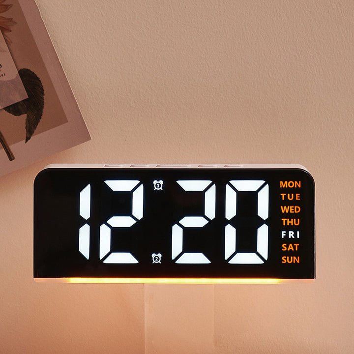 Digital alarm clock with large LED display and multifunctional display