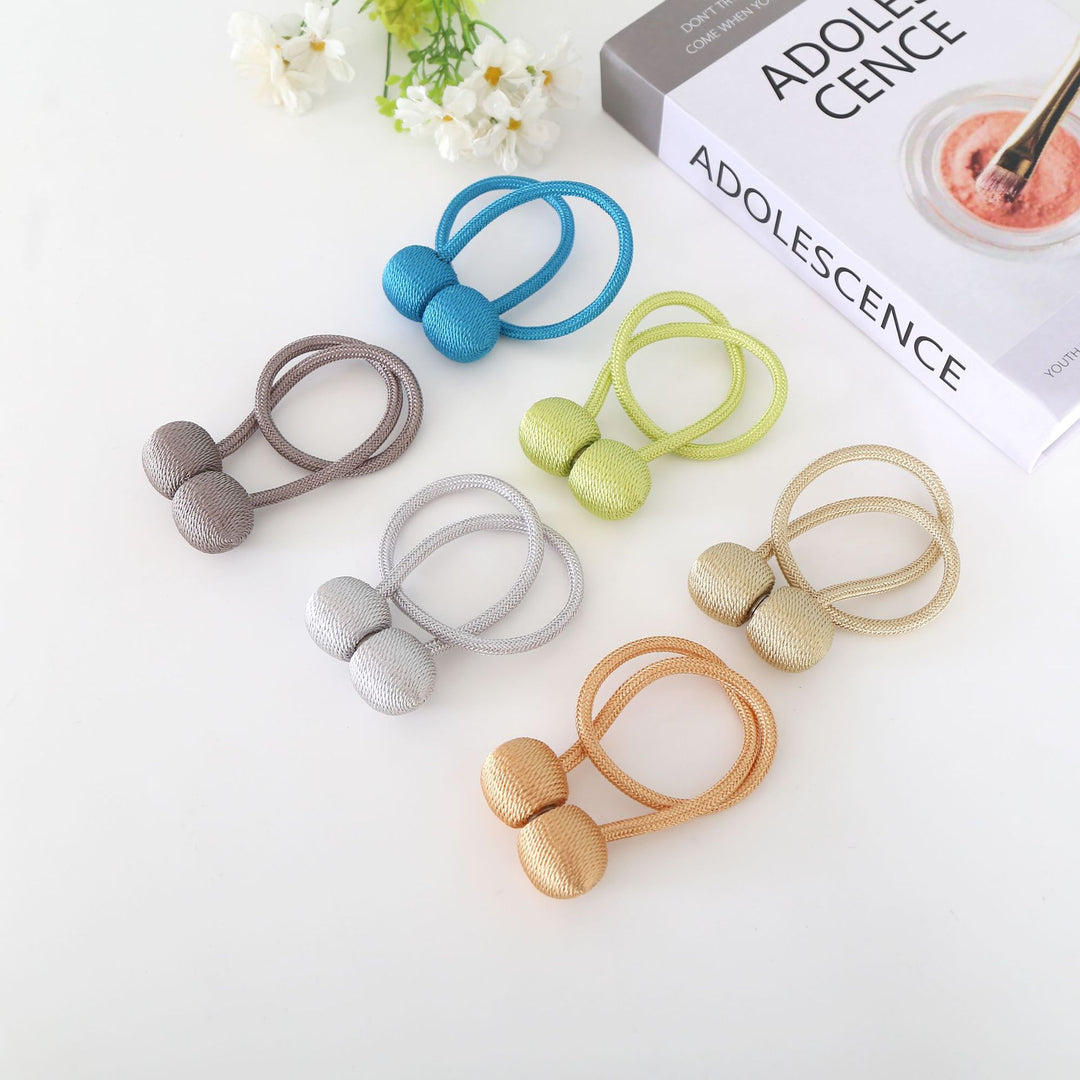 Decorative curtain tieback