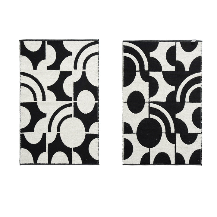Modern runner rug with graphic checkerboard pattern and short pile structure