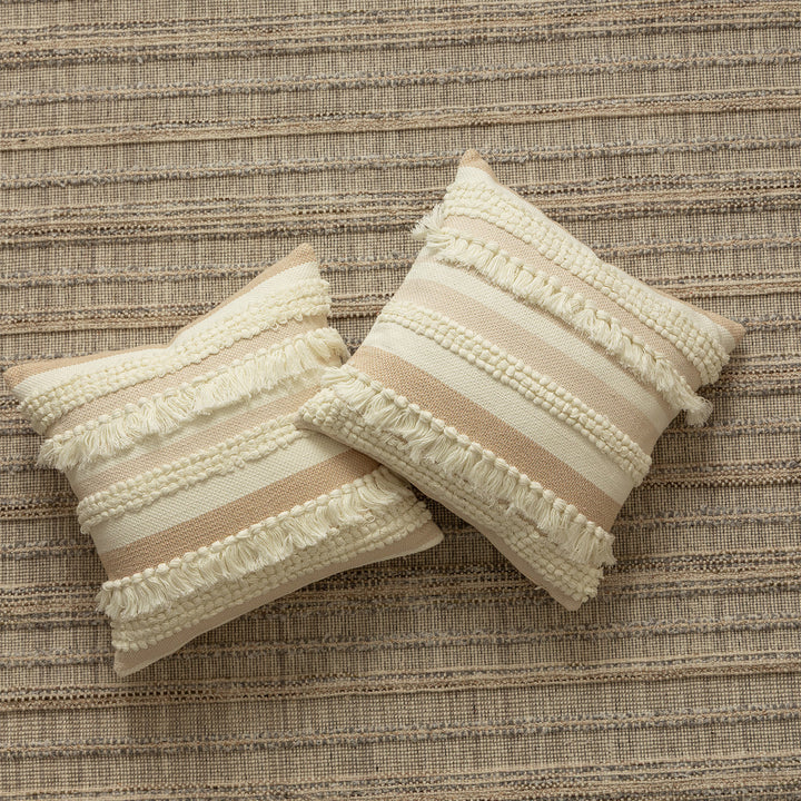 Decorative woven cushion cover with fringes and textured striped design