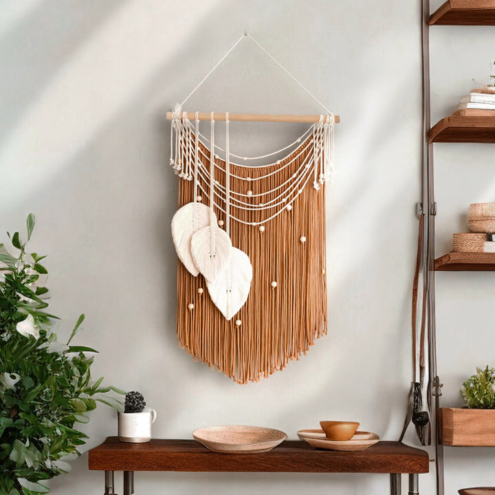 Artistic wall hanging made of macrame with hearts