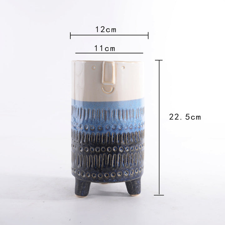 Decorative plant pot with facial features