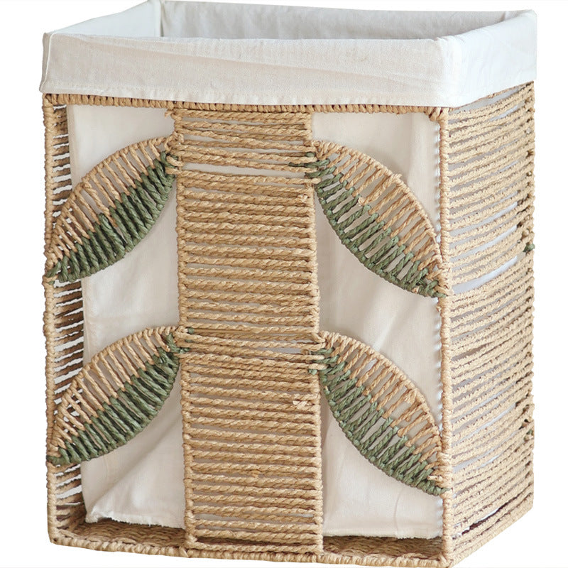 Elegant laundry basket made of natural wicker with fabric lining