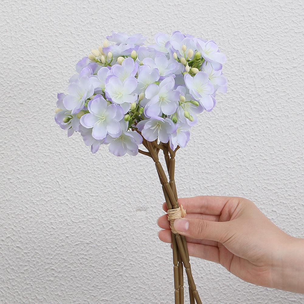 Artificial flower bouquet with delicate blooms
