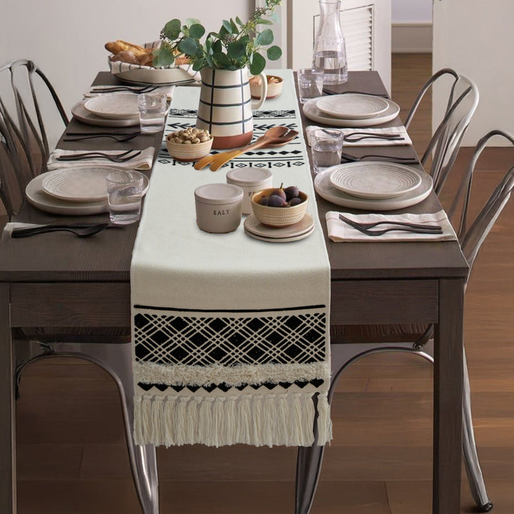 Boho table runner made of cotton blend with woven ethnic jacquard and decorative fringes