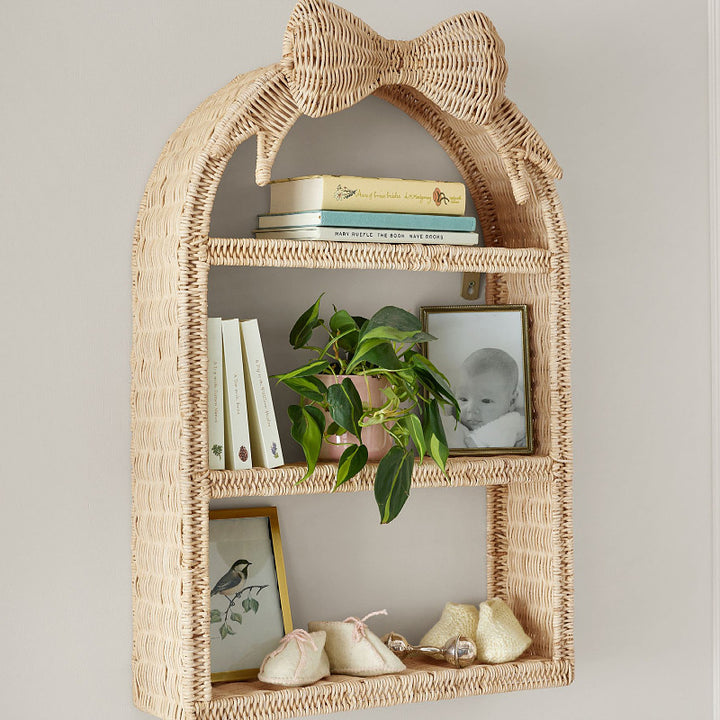 Playful wall shelf in butterfly design