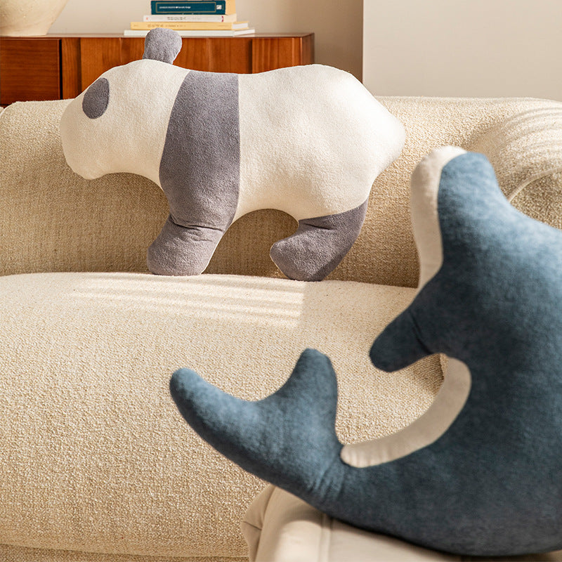 Playful dolphin cuddle pillow with ergonomic neck and arm recess