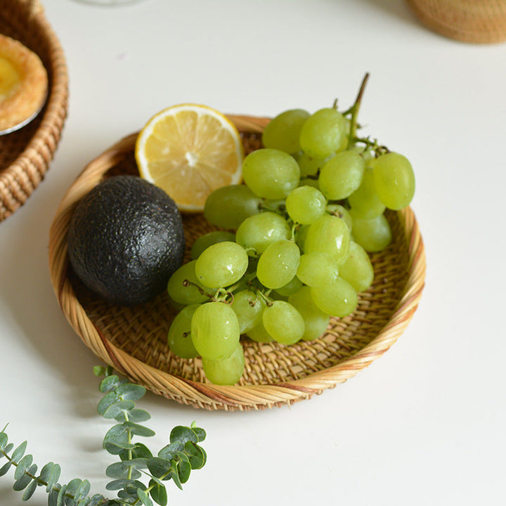 Round serving platter made of braided rattan