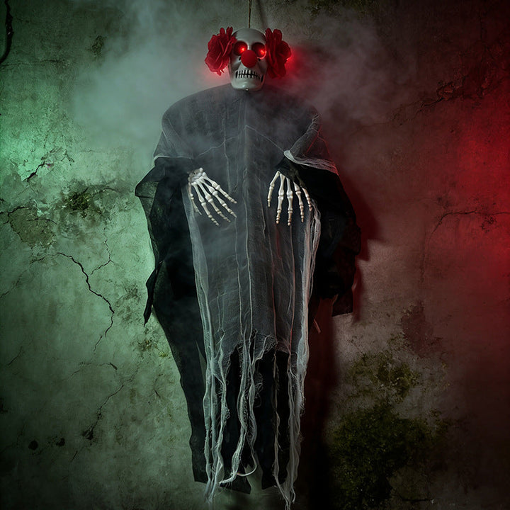 Creepy hanging decoration skeleton with glowing eyes