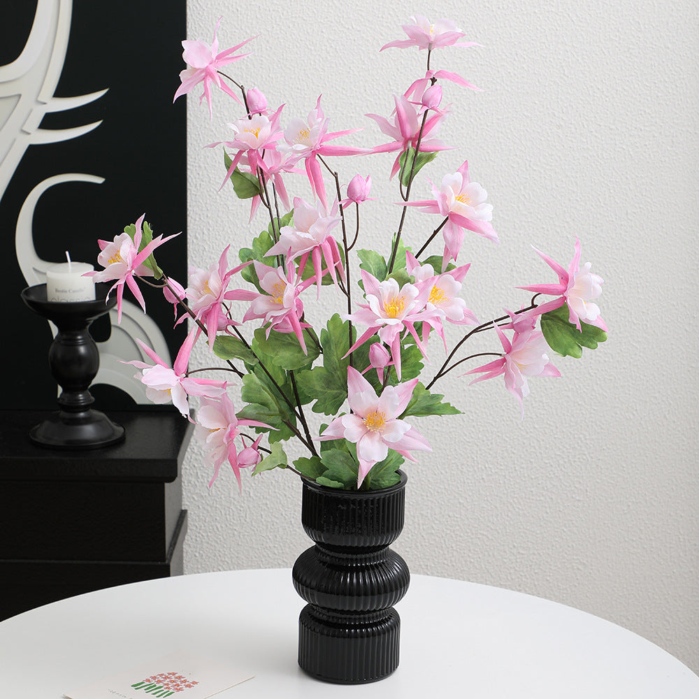Artificial bouquet with intricate flowers and leaves