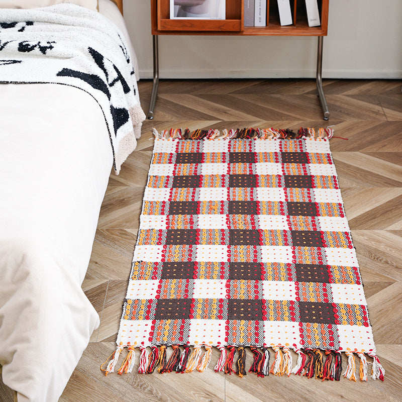 Flat-woven runner rug with check pattern and decorative border stripe