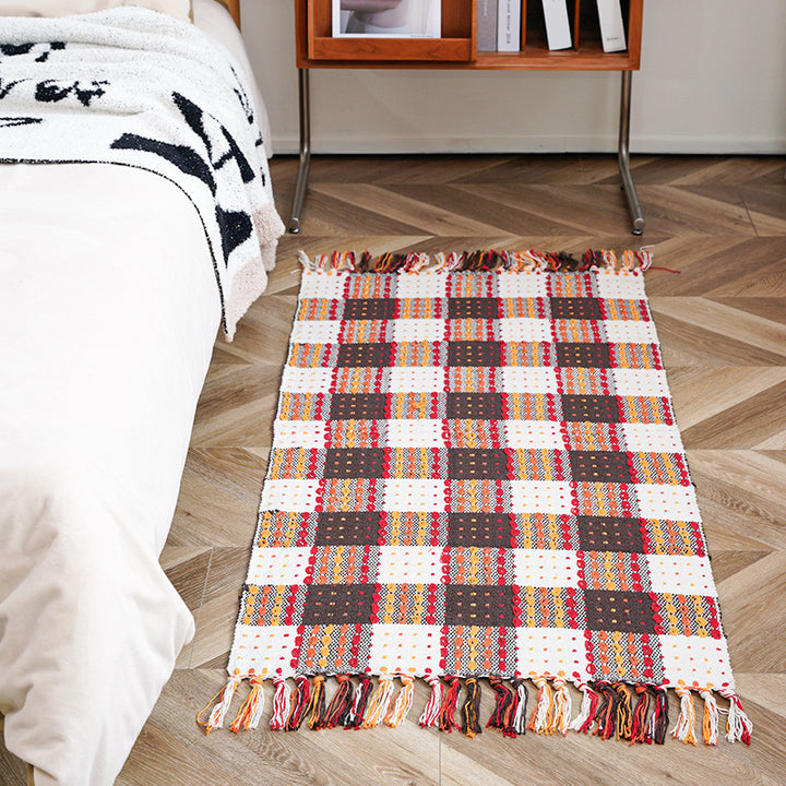 Flat-woven runner rug with check pattern and decorative border stripe
