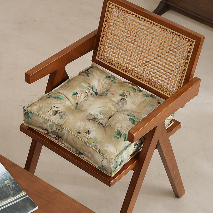 Padded square seat cushion with tufted stitching and fine bamboo print