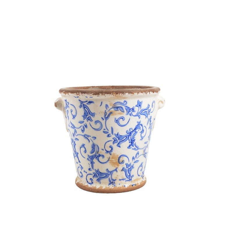 Decorative flower pot with floral embellishments