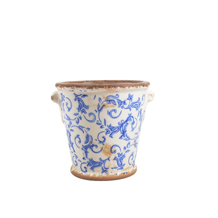 Decorative flower pot with floral embellishments