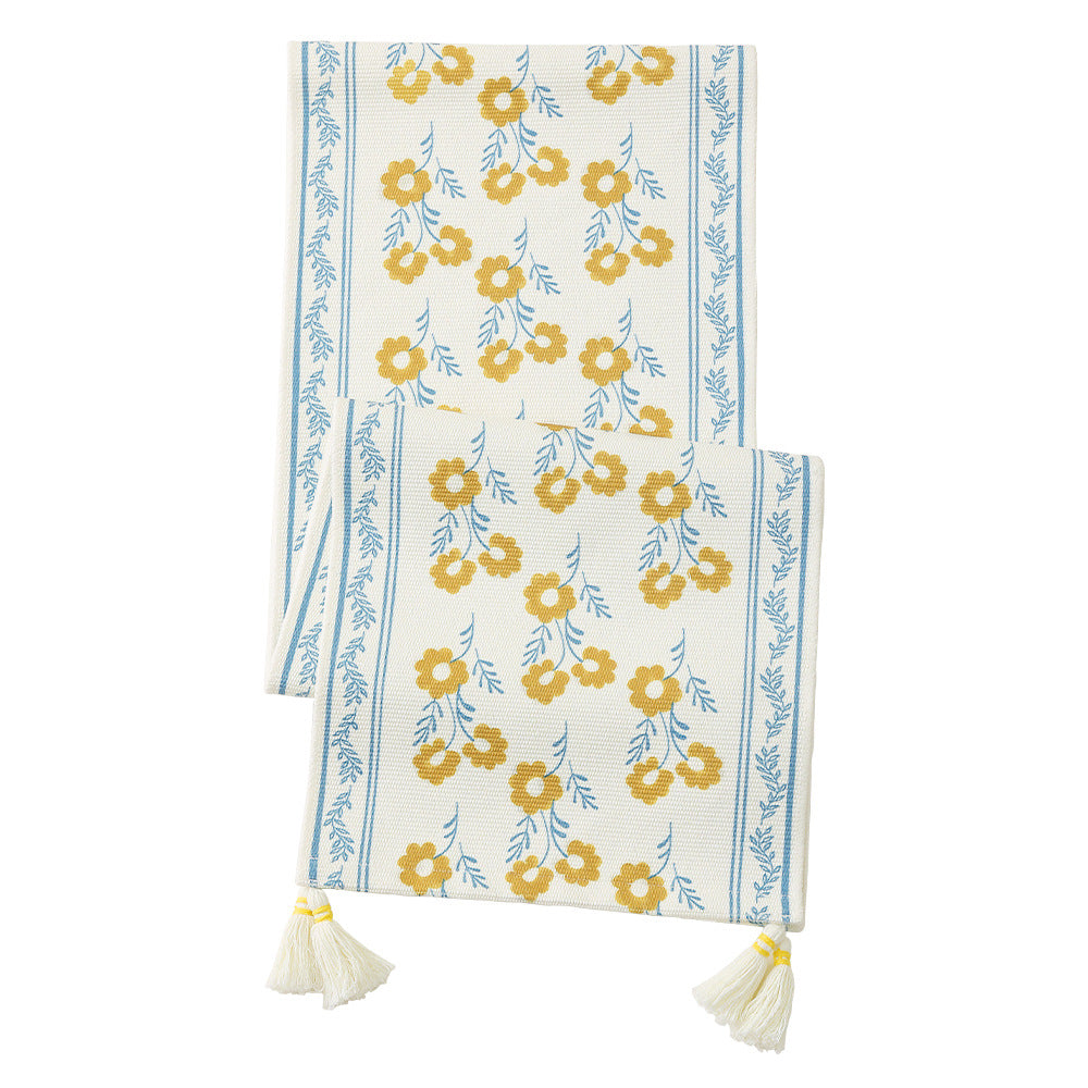 decorative table runner made of woven cotton with tassels