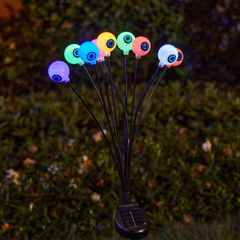 Creepy garden lights with eye motif
