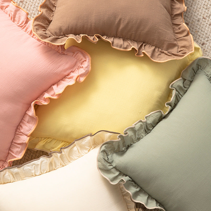 Square decorative pillow with ruffle and linen look