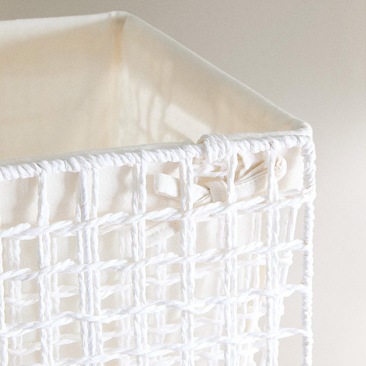 Modern laundry basket with embroidered pattern
