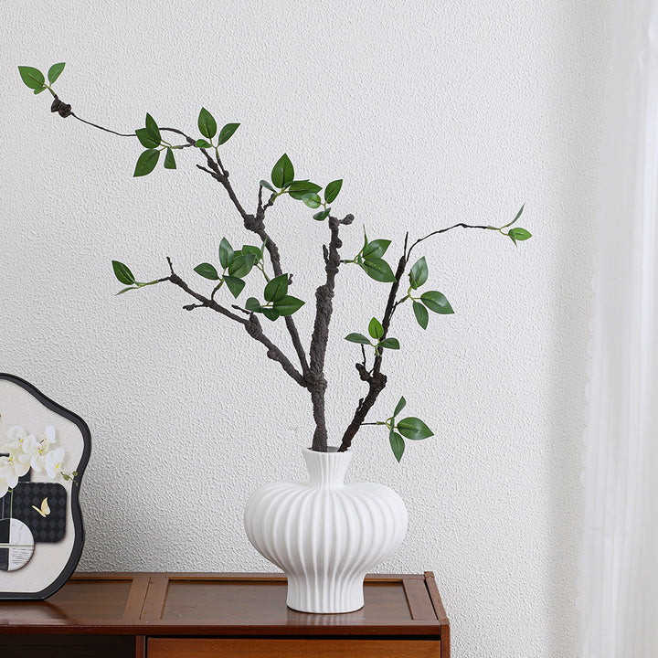 Decorative artificial tree branch with realistic leaves