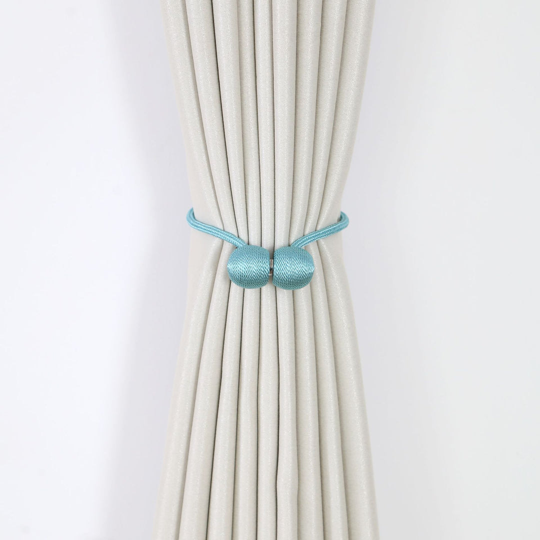 Decorative curtain tieback
