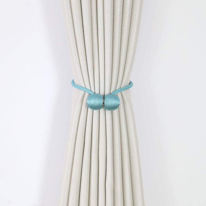 Decorative curtain tieback