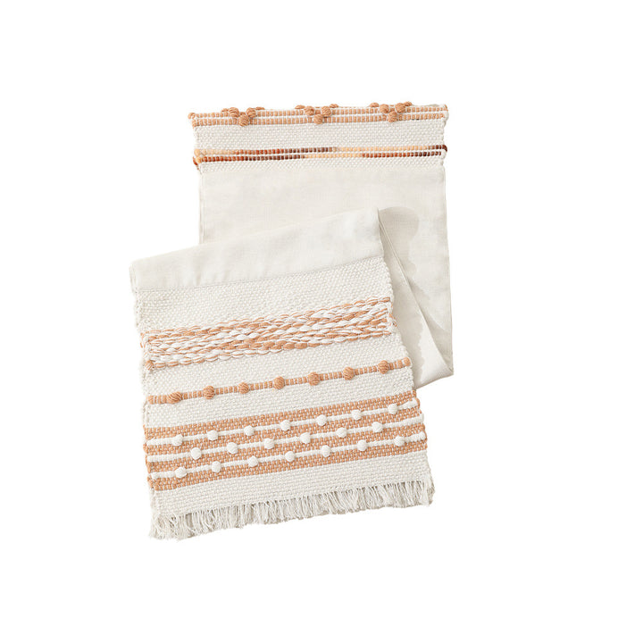Woven cotton table runner with fringes and textured pattern