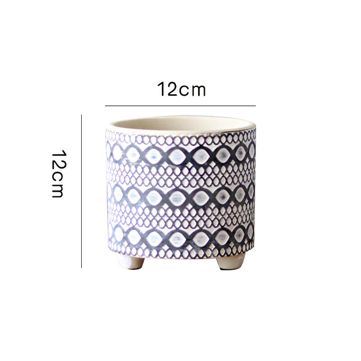 Decorative plant pot with geometric pattern
