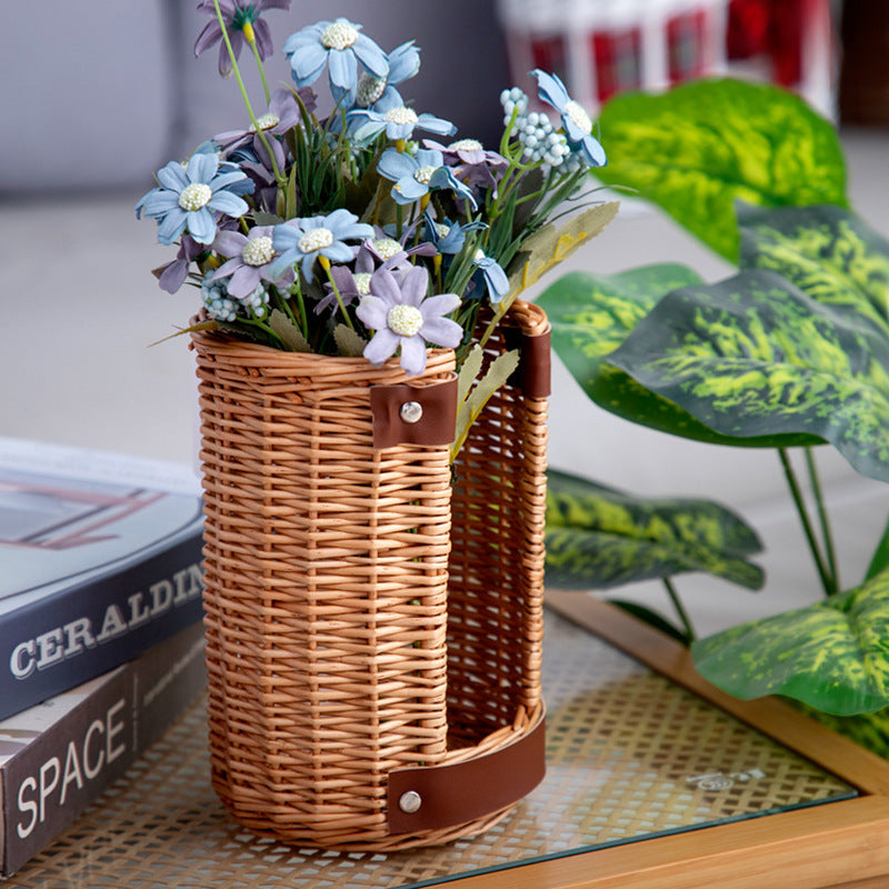 Handcrafted storage basket with leather handles