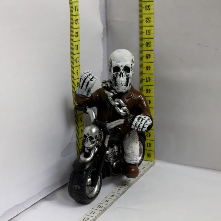 Creepy motorcycle figure
