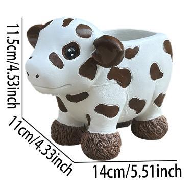 Flower pot in the shape of a cow