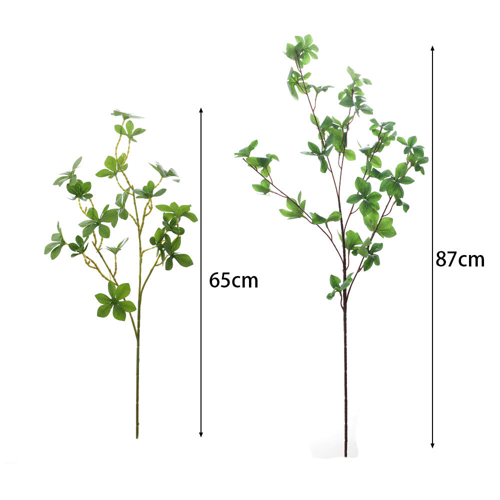 Decorative artificial branch with vibrant leaves
