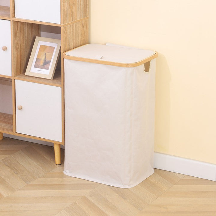 Stylish laundry basket with wooden lid