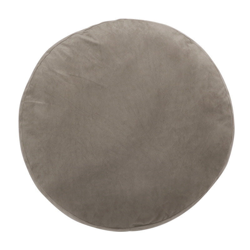 Round seat pouf with soft velvet cover, removable zipper, and shape-stable filling