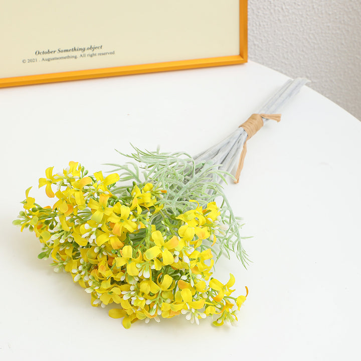 Decorative artificial flower arrangement