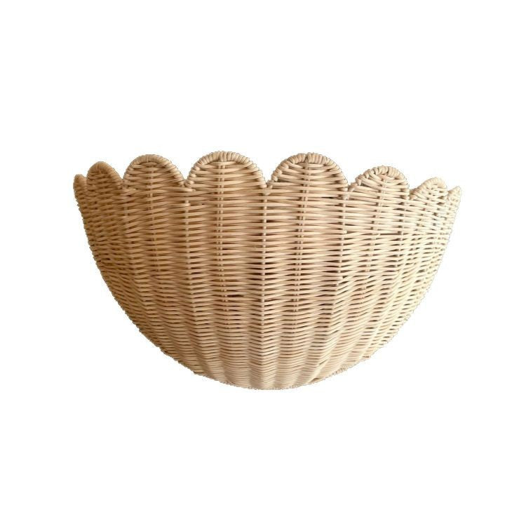Handwoven wall basket with wave pattern