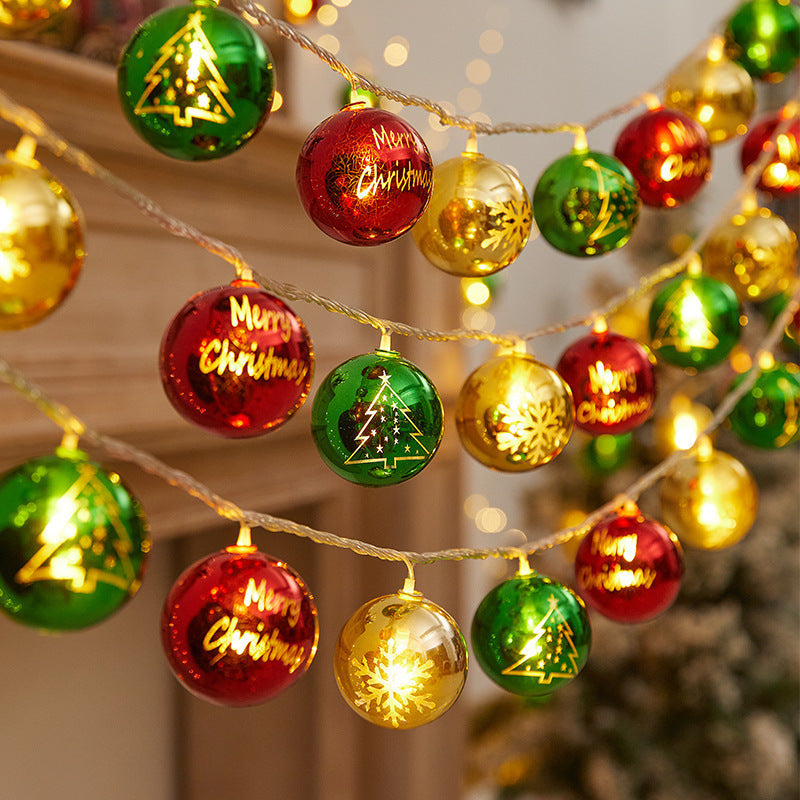 Festive string lights with Christmas ornaments